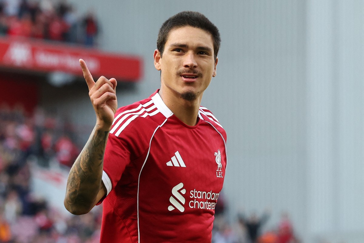Liverpool's Uruguayan striker #09 Darwin Nunez celebrates scoring the team's second goal at Anfield in Liverpool, north west England on August 4, 2025. (Photo by Darren Staples / AFP)
