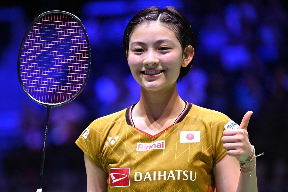 Japan's Tomoka Miyazaki poses after winning agianst Turkiye's Neslihan Arin on August 26, 2025. (Photo by Bertrand Guay / AFP)