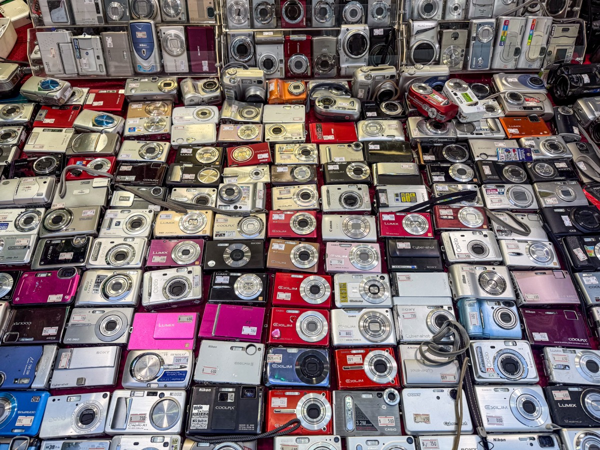 An array of small digital cameras on display in Hong Kong in August. Photo credit: Chris Velazco/The Washington Post
