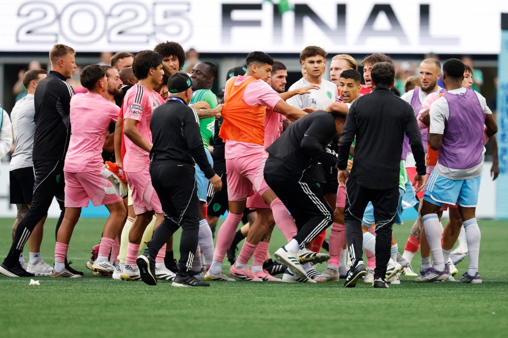 Players of Seattle Sounders FC and Inter Miami CF fight after the Leagues Cup Final match between Seattle Sounders and Inter Miami CF at Lumen Field on August 31, 2025 in Seattle, Washington. Alika Jenner/Getty Images/AFP 
