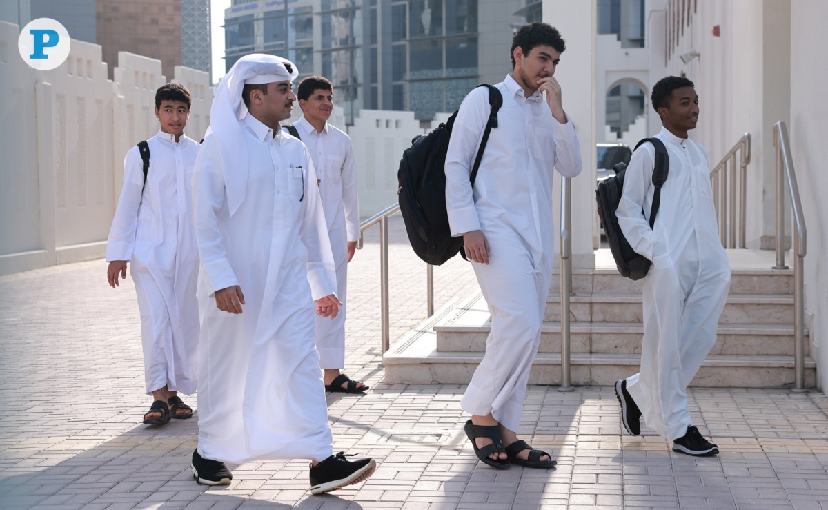 Students arrive at a public school on the first day of the new academic year yesterday. Pic: Rajan Vadakkemuriyil / The Peninsula