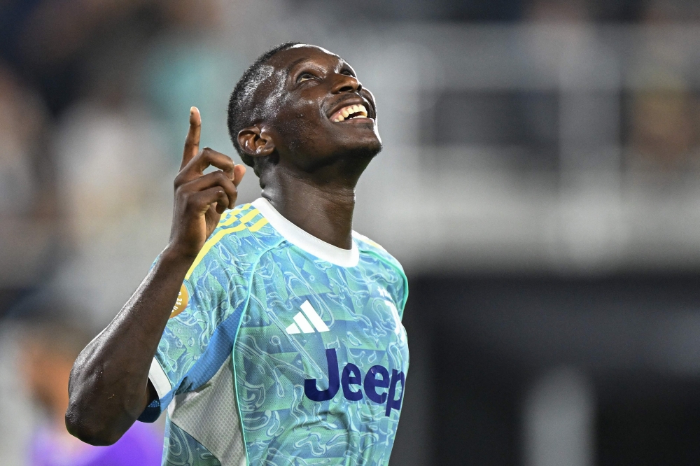 Juventus' French forward #20 Randal Kolo Muani celebrates scoring his team's fourth goal during the FIFA Club World Cup 2025, on June 18, 2025. (Photo by Roberto Schmidt / AFP)