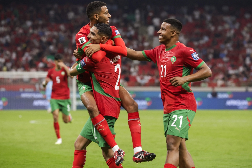 Morocco's midfielder Azzedine Ounahi celebrates scoring with teammates during the FIFA World Cup 2026 Group E African qualification football match between Morocco and Niger at the Prince Moulay Abdellah Sports Complex in Rabat on September 5, 2025. (Photo by Abdel Majid Bziouat / AFP)