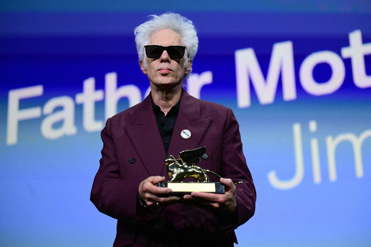 US director Jim Jarmusch poses with the Golden Lion for Best Film he reveived for 'Father Mother Sister Brother' during the award ceremony of the 82nd Venice Film Festival on September 6, 2025 at Venice Lido. (Photo by Tiziana FABI / AFP)

