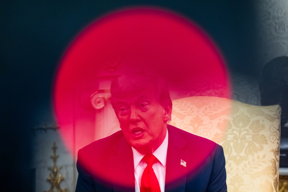 US President Donald Trump speaks in the Oval Office in Washington. (Photo by Demetrius Freeman/The Washington Post)