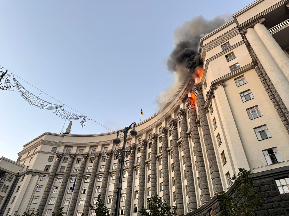 This handout photograph taken and released by Ukrainian State Emergency Service on September 7, 2025, shows a fire at the Ukrainian government building in Kyiv, following an overnight Russian attack. (Photo by Handout / Ukrainian State Emergency Service / AFP)