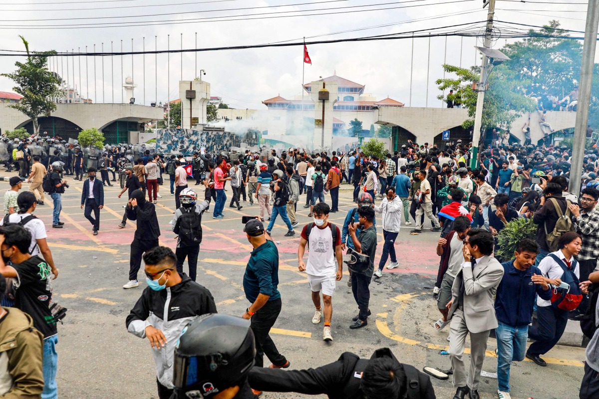 Demonstrators stage a protest outside the Parliament in Kathmandu on September 8, 2025, held to condemn the government over social media prohibitions and corruption. Photo by Prabin RANABHAT / AFP