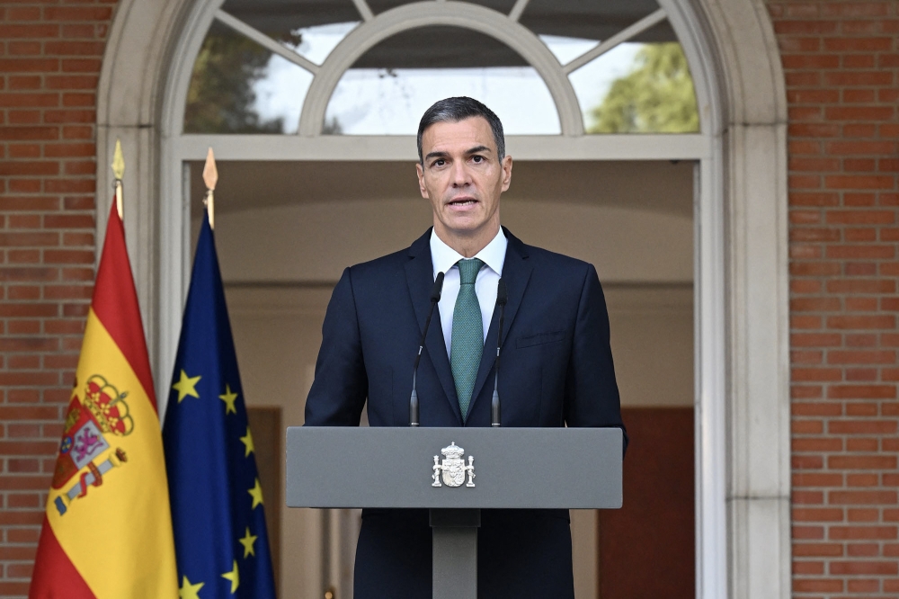 This handout photo taken on September 8, 2025 and provided by the Moncloa Palace shows Spanish Prime Minister Pedro Sanchez announcing several measures including an arms embargo on Israel and a ban on ships carrying fuel for Israeli military personnel from docking in Spanish ports, to