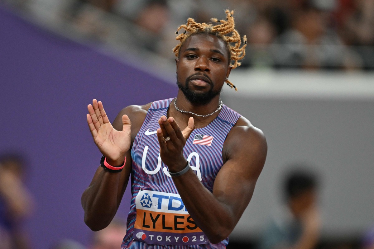 US sprinter Noah Lyles celebrates after competing in the men's 100m heats during the World Athletics Championships in Tokyo on September 13, 2025. (Photo by Andrej ISAKOVIC / AFP)