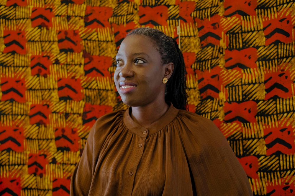 Senegalese director Angele Diabang, poses for a portrait at her apartment in Dakar, on September 5, 2025. (Photo by Carmen Abd Ali / AFP)
 