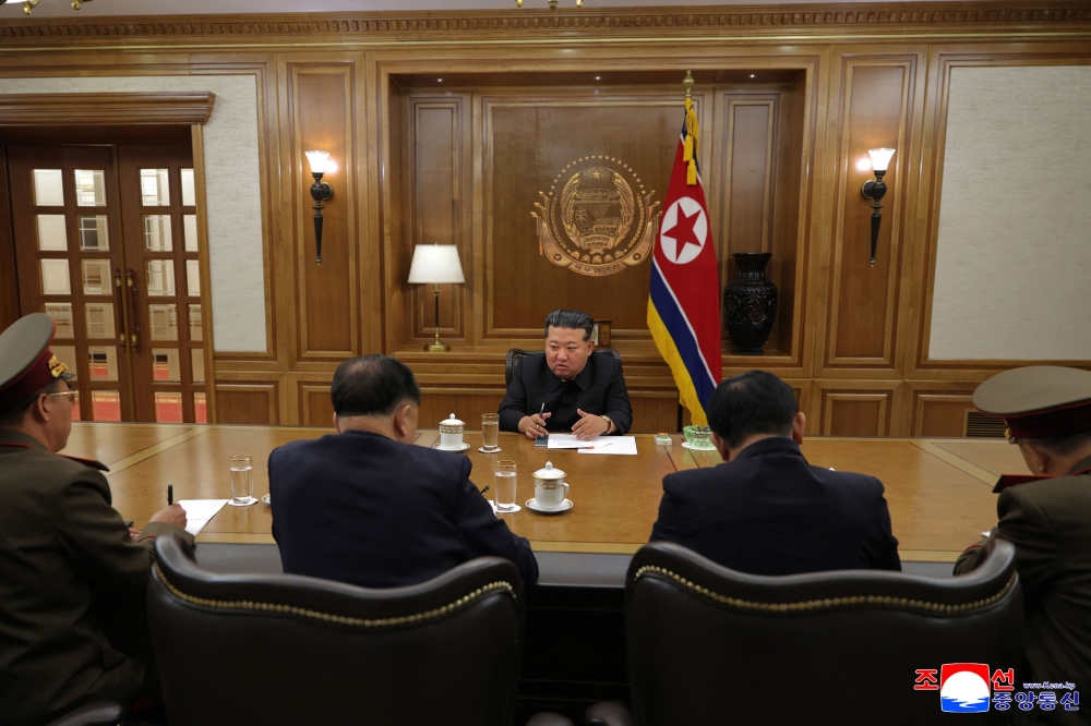 This picture taken on September 26, 2025 and released from North Korea's official Korean Central News Agency (KCNA) on September 27, 2025 shows North Korean leader Kim Jong Un attending a consultation meeting on nuclear materials, at an undisclosed location in North Korea. (Photo by KCNA VIA KNS / AFP)