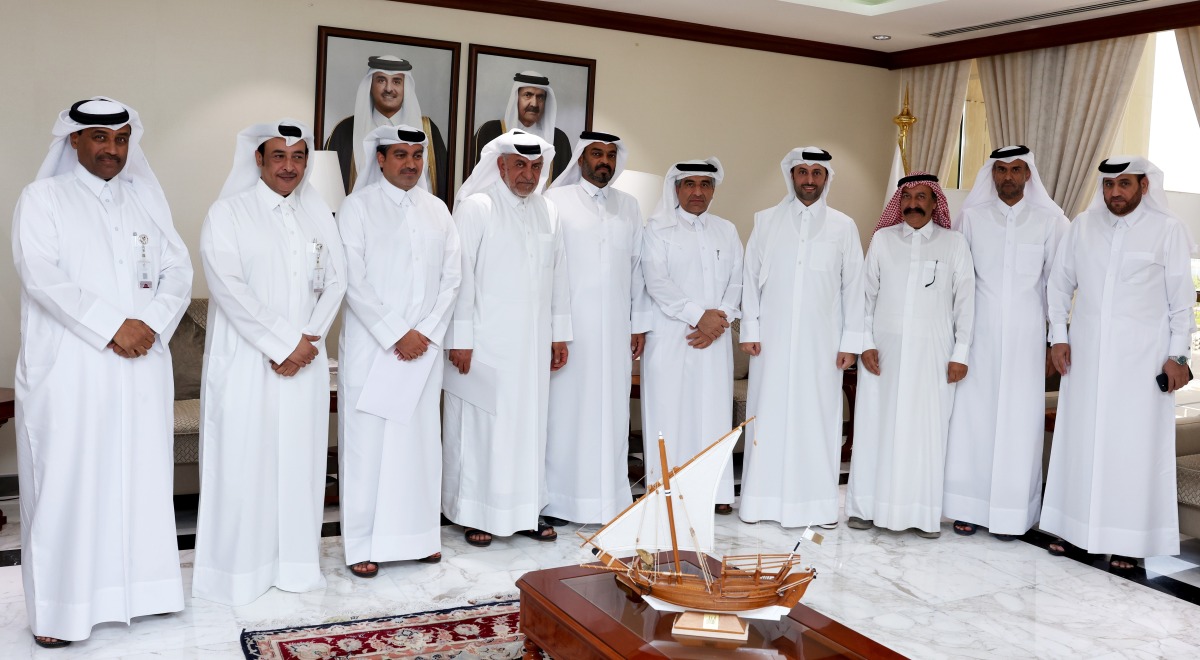 Minister of Municipality H E Abdullah bin Hamad bin Abdullah Al Attiyah (fourth right) with fishermen during the meeting