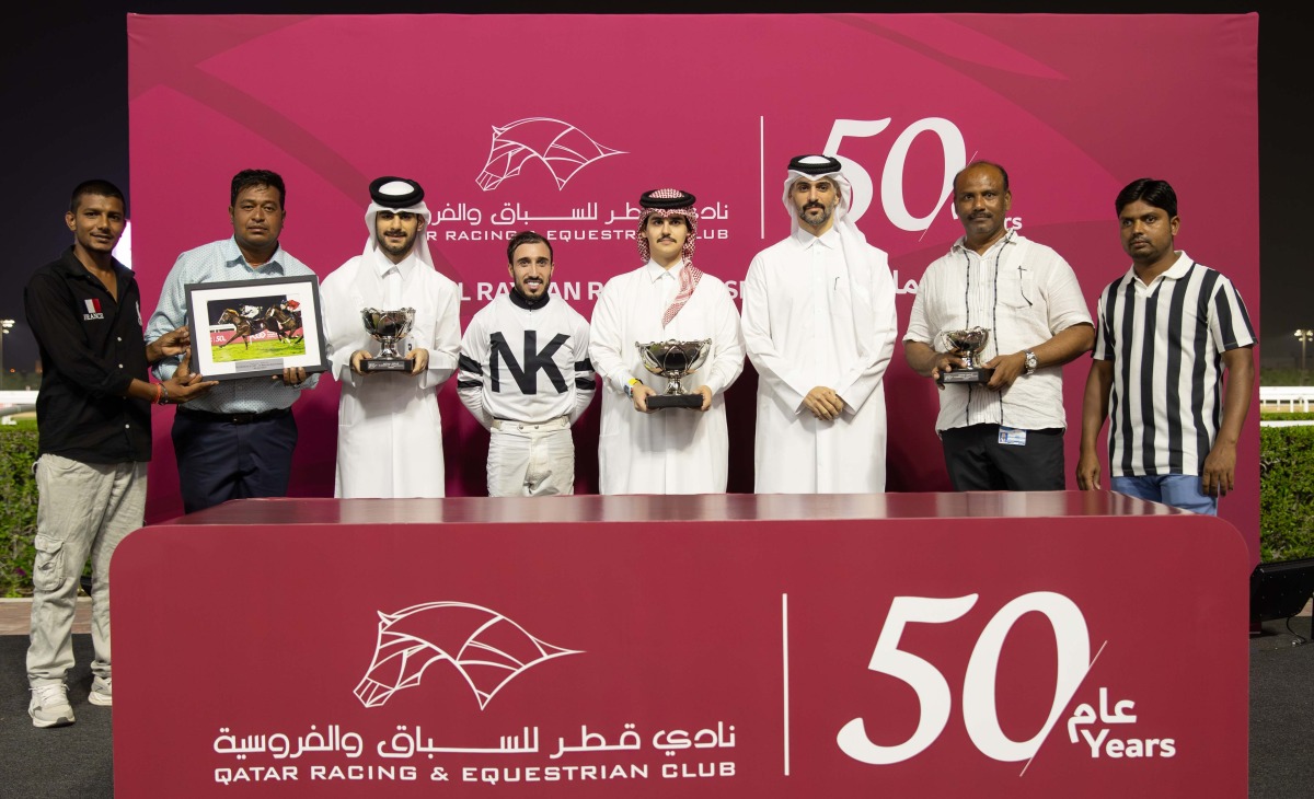 The connections of Alzabyr pose with their trophies. PICS: Juhaim/QREC