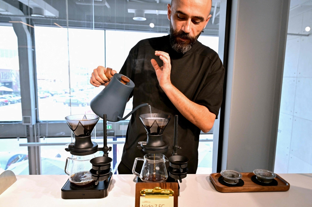 Nido 7FC Panama coffee, that costs 3600 AED (around 980 US dollars), is presented at the Julith Coffee cafe in Dubai on October 30, 2025. (Photo by Giuseppe Cacace / AFP)