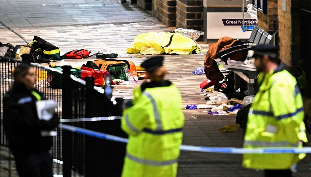 Paramedics medical equipment is pictured inside a police cordon outside Huntingdon Station in Huntingdon, eastern England, on November 1, 2025, following a stabbing on a train. Photo by Justin Tallis / AFP