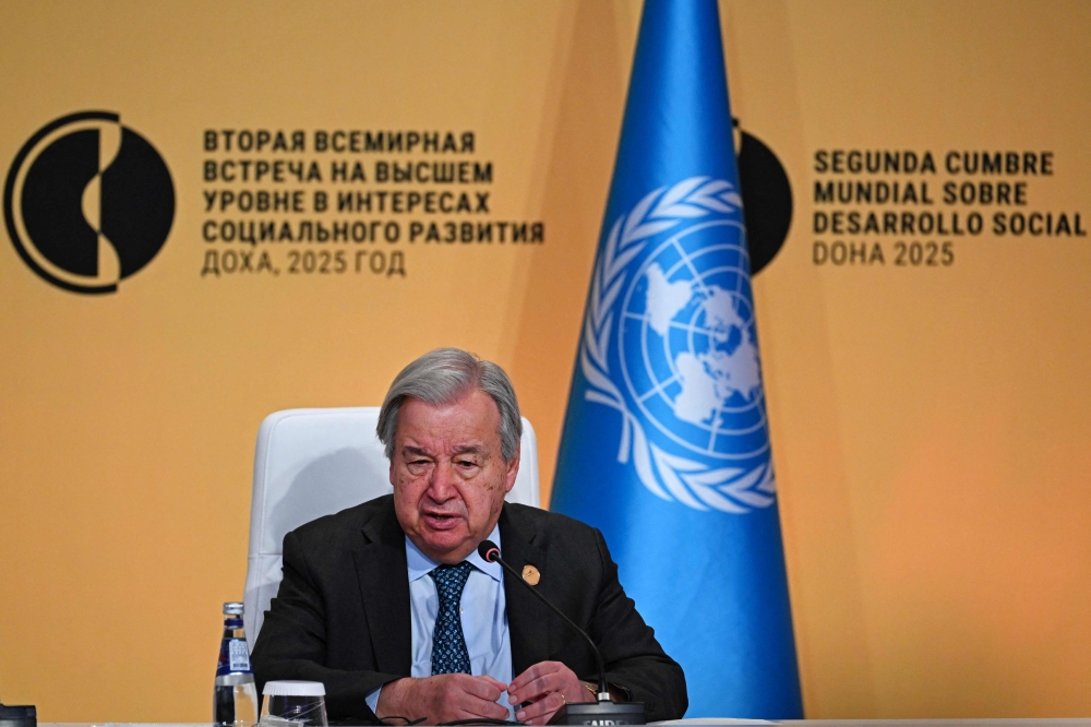 UN Secretary-General Antonio Guterres attends a press conference during the United Nations' Second World Summit for Social Development in Doha on November 4, 2025. (Photo by Mahmud Hams / AFP)