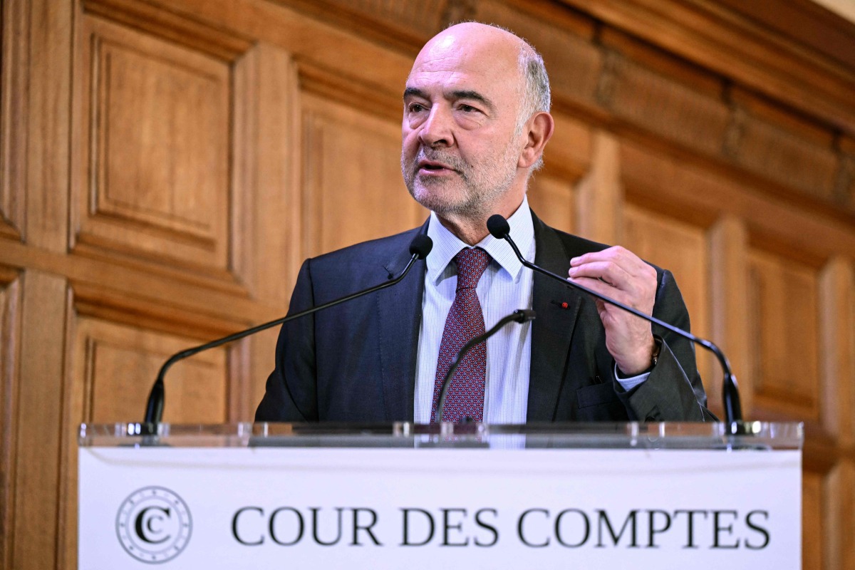 French Court of Accounts (Cour des comptes) first President Pierre Moscovici speaks during the presentation of the Court of Accounts' report on the Louvre, at the Court of Accounts in Paris on November 6, 2025. Photo by Bertrand GUAY / AFP