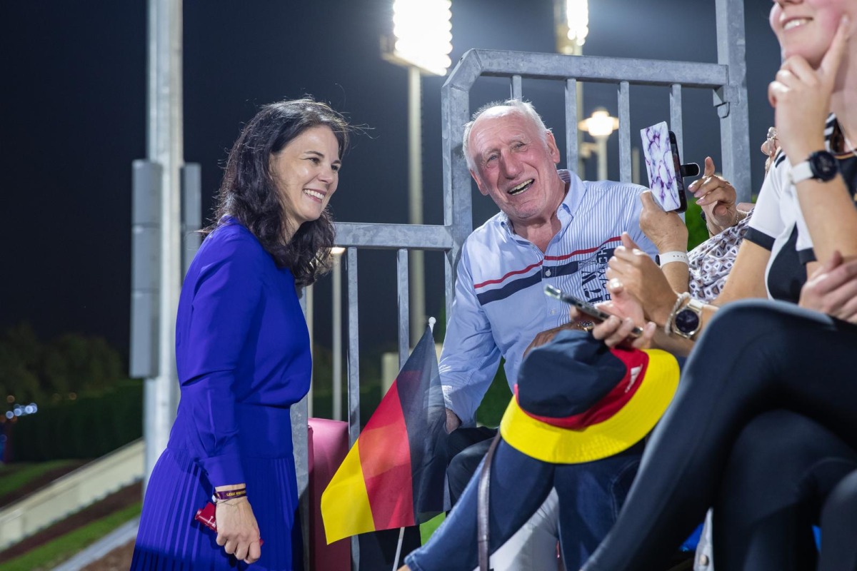 President of the 80th Session of the UN General Assembly Annalena Baerbock speaks with spectators.