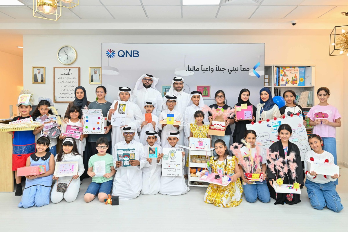 QNB Officials with participants during 'The Junior Entrepreneur' programme.
