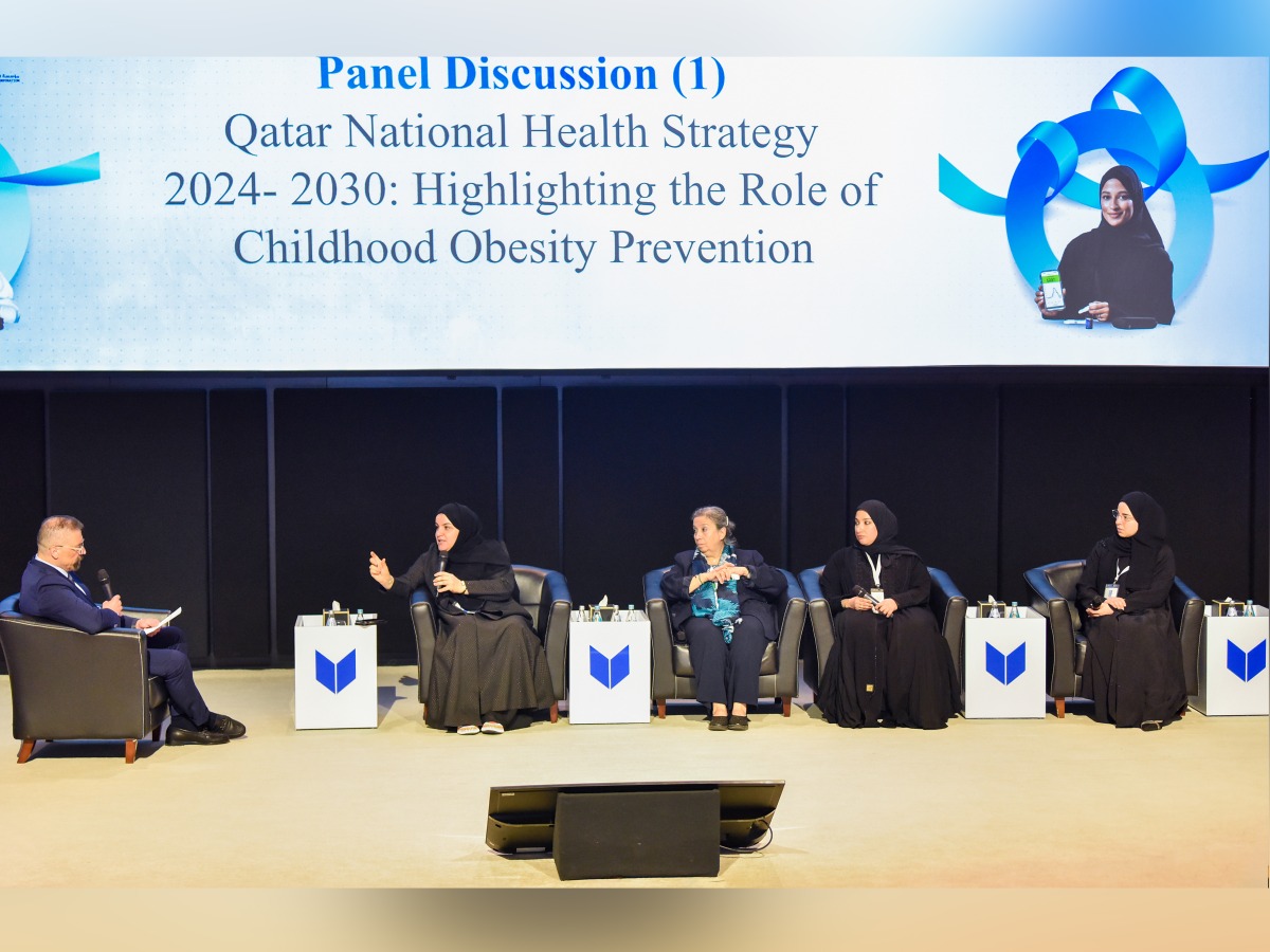 Guests speaking at a panel discussion.
