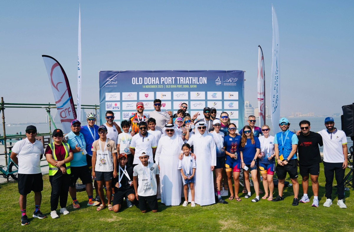 Participants receiving awards at the Qatar Triathlon League for the 2025/2026 that took place at Old Doha Port