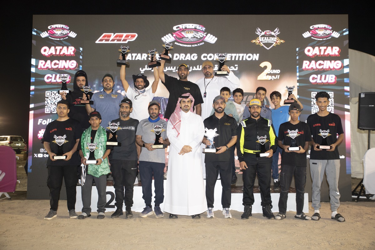 QRC Director Sheikh Jabor bin Khalid Al-Thani poses for a photo with the podium winners.