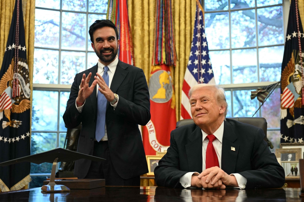 US President Donald Trump (R) meets with New York Mayor-elect Zohran Mamdani in the Oval Office of the White House in Washington, DC, on November 21, 2025. (Photo by Jim Watson / AFP)