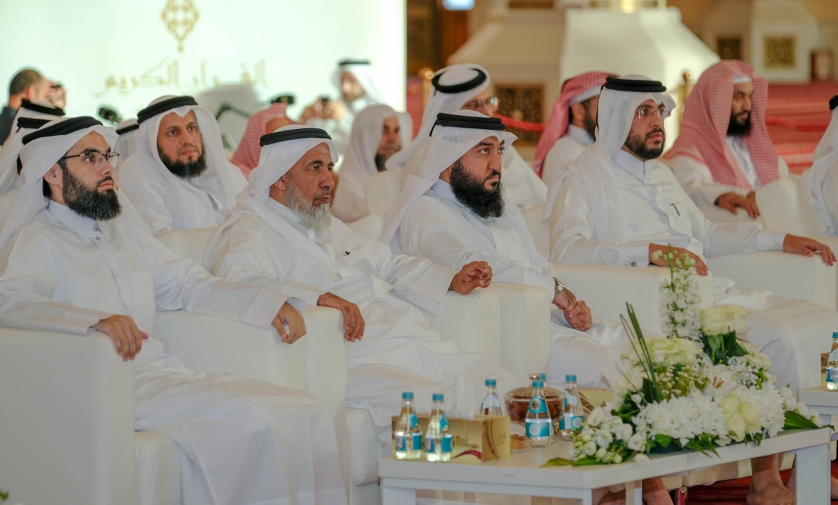 Minister of Awqaf and Islamic Affairs H E Ghanem bin Shaheen bin Ghanem Al Ghanim with other officials during the Holy Quran competition.