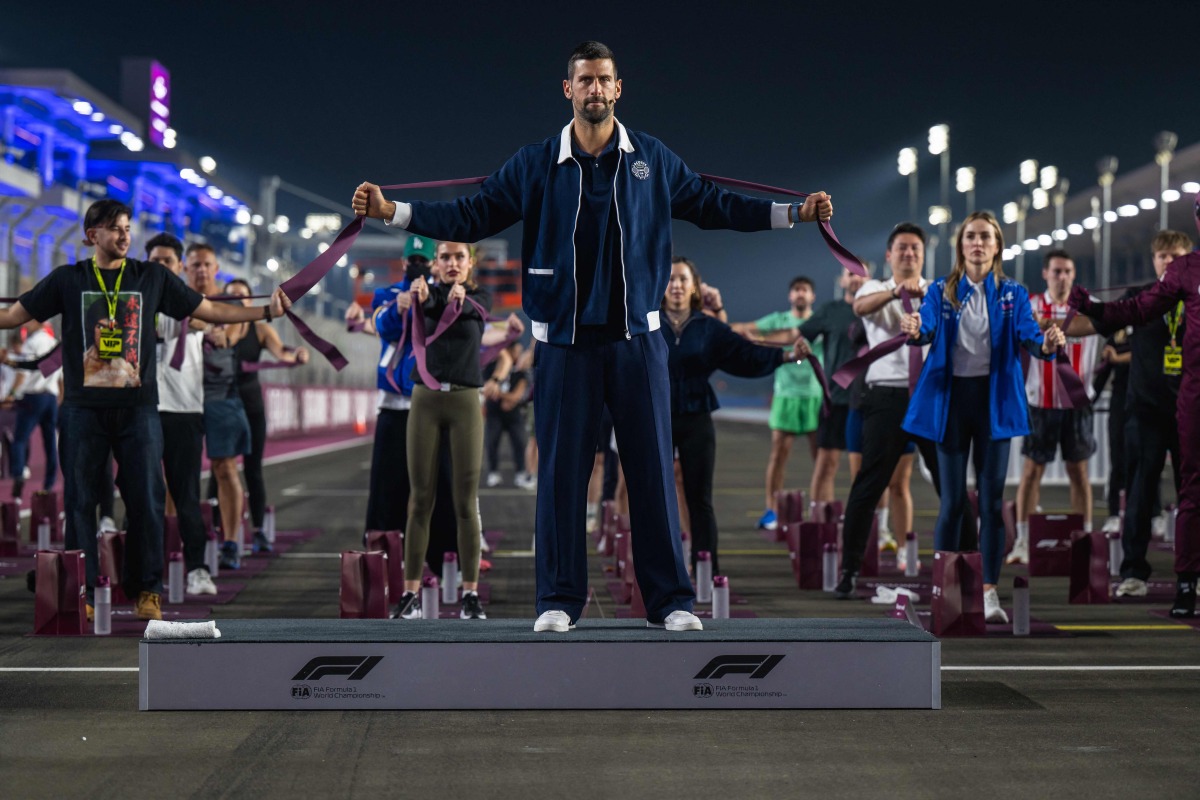 Serbian tennis star Novak Djokovic leads a movement session at the Lusail International Circuit track yesterday. AFP