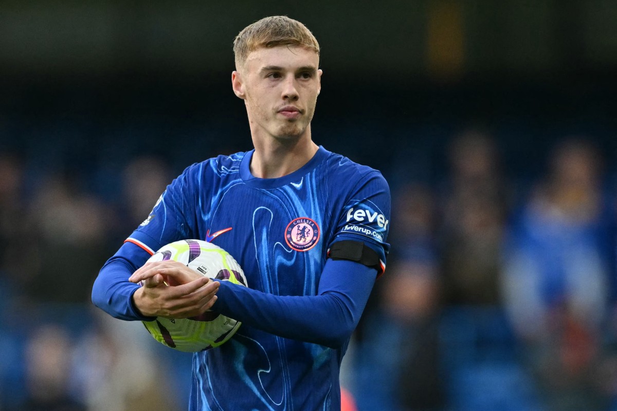File photo: Chelsea's English midfielder #20 Cole Palmer walks off with the match ball having score all four goals in the English Premier League football match between Chelsea and Brighton and Hove Albion at Stamford Bridge in London on September 28, 2024. Photo by Glyn KIRK / AFP.

