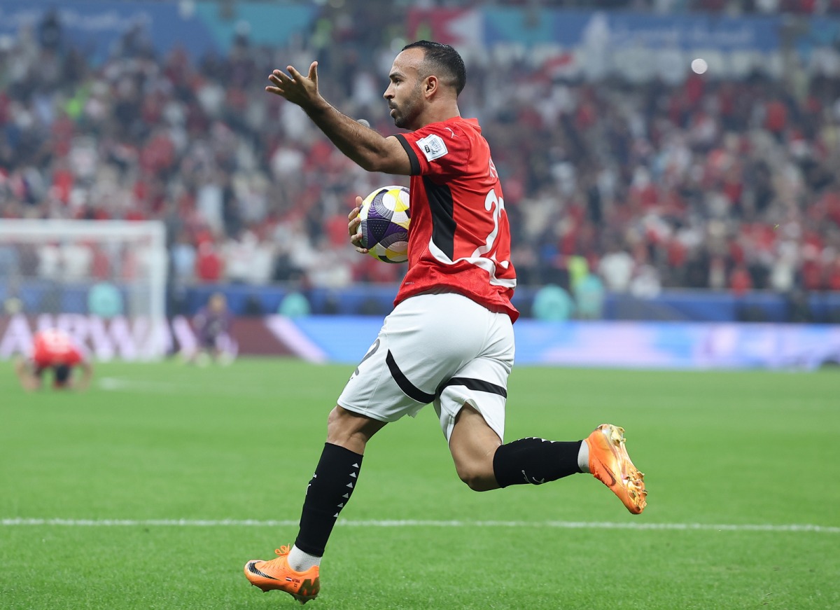 Egypt's Mohamed Magdy celebrates after scoring the equaliser. PIC: RAJAN VADAKKEMURIYIL/THE PENINSULA