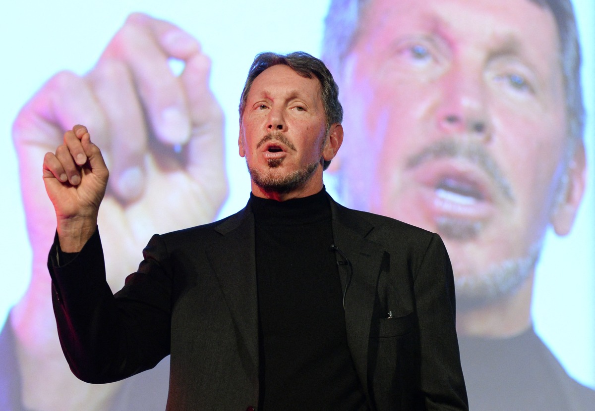 Larry Ellison, CEO of Oracle Corporation, gestures as he makes a speech during the New Economy Summit 2014 in Tokyo on April 9, 2014. Photo by TORU YAMANAKA / AFP