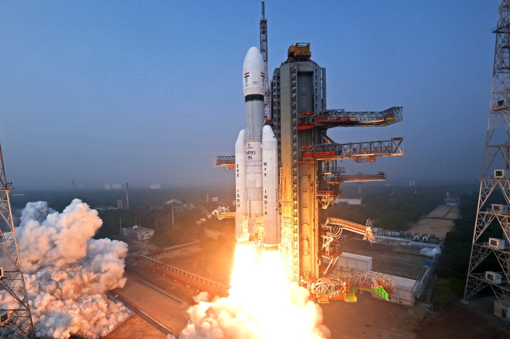 This handout photograph taken and released on December 24, 2025 by the Indian Space Research Organisation (ISRO) shows ISRO's launch vehicle LVM3-M6 carrying the United States’ next-generation BlueBird Block-2 communication satellite of AST SpaceMobile lifting off from the launch pad at the Satish Dhawan Space Centre in Sriharikota in India's Andhra Pradesh state. (Photo by Indian Space Research Organisation (ISRO) / AFP) 