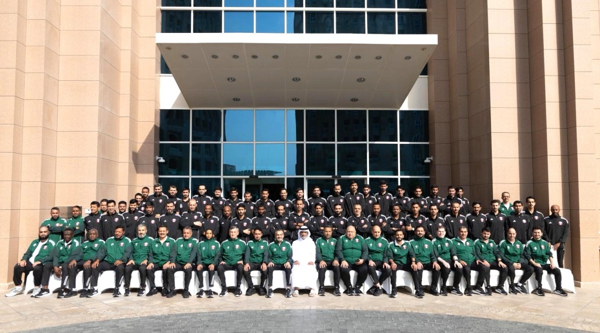 Minister of Sports and Youth H E Sheikh Hamad bin Khalifa bin Ahmed Al Thani poses for a photo with the participants and officials at the winter camp for elite referees. 