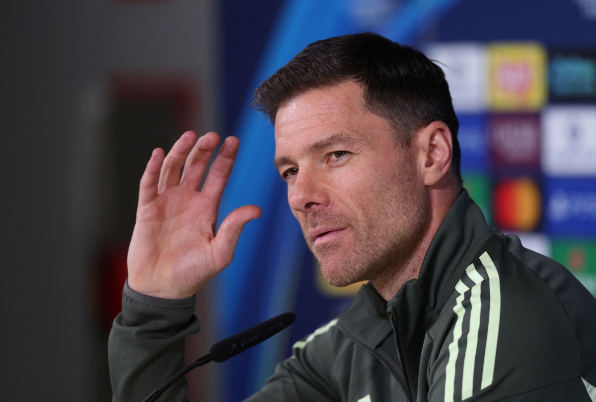 Real Madrid's Spanish coach Xabi Alonso gestures as he gives a press conference at Valdebebas training grounds in Madrid on December 9, 2025 on the eve of their Champions League football match against Manchester City. (Photo by Pierre-Philippe MARCOU / AFP)