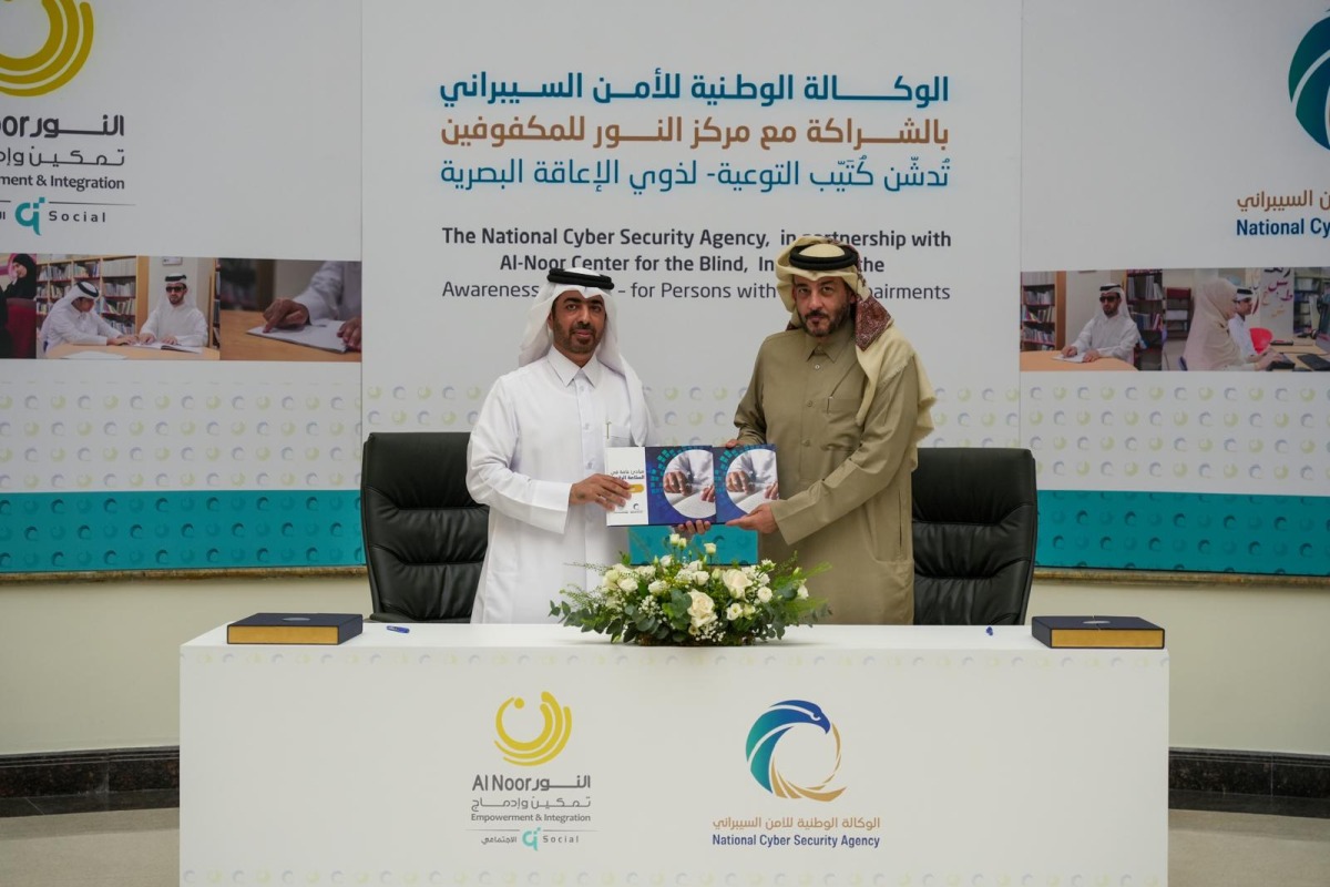 President of the National Cyber Security Agency H E Engineer Abdulrahman bin Ali Al-Farahid Al-Malki and  Executive Director of Al Noor Center for the Blind Mishaal bin Abdullah Saqr Al-Nuaimi during the launch event. 