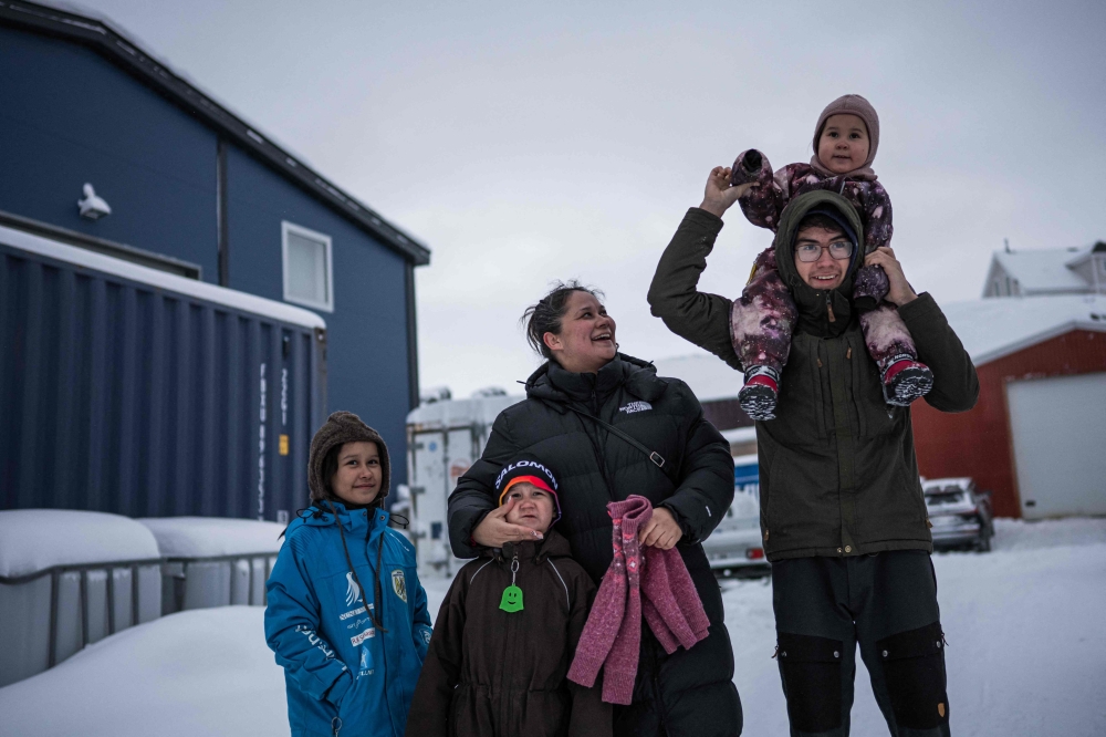Lykke Lynge and her kids are photographed in Nuuk, Greenland, on January 19, 2026. (Photo by Jonathan Nackstrand / AFP)