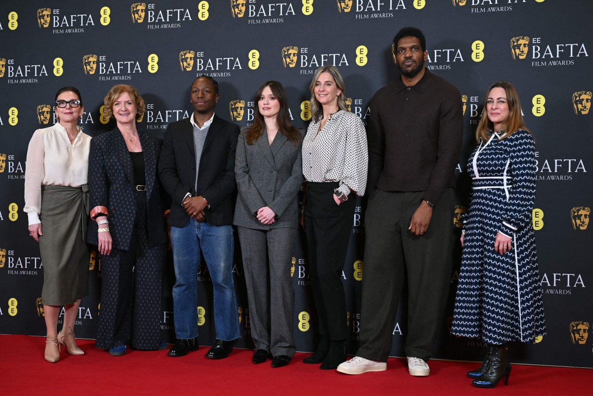 (L-R) BAFTA CEO Jane Millichip, Chair of BAFTA, Sara Putt, British actor David Jonsson, British actor Aimee Lou Wood, Chair of the Film Committee, Emily Stillman, Deputy Chair of the Film Committee, Anthony Andrews and Executive Director of Awards and Content, Emma Baehr pose for a picture at the announcement of the British Academy Film Awards (BAFTA) nominations in central London on January 27, 2026. (Photo by JUSTIN TALLIS / AFP)