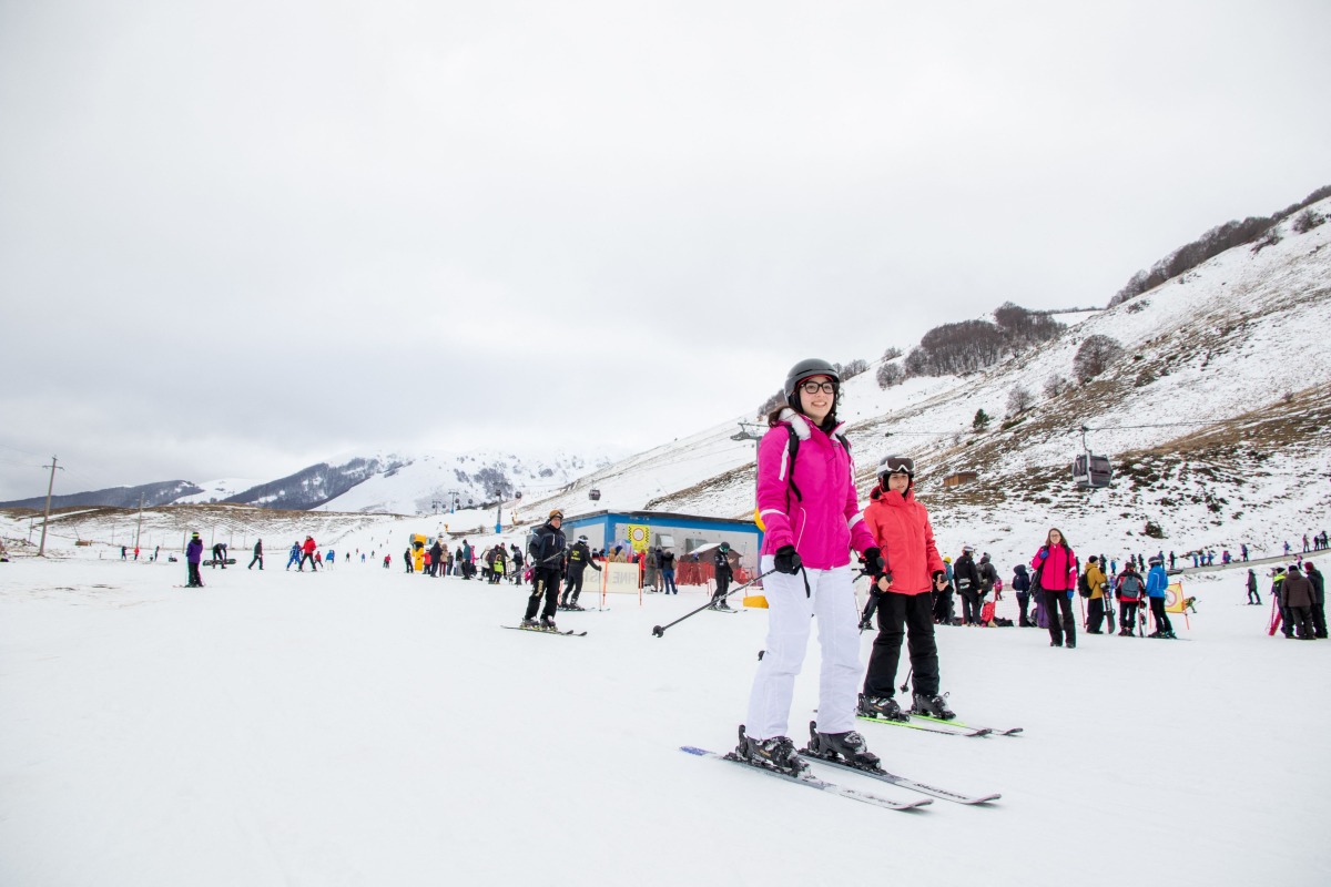Tourists ski in the small ski resort of Roccaraso in the Abruzzo region, on January 18, 2026. Photo by Luca PRIZIA / AFP