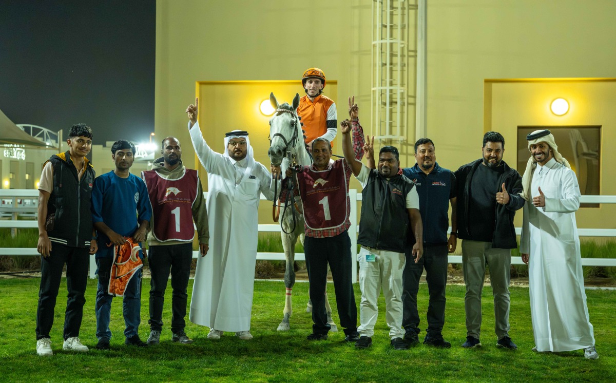 The connections of Mutamarrid celebrate their Ras Rokn Island Cup triumph. PIC: Juhaim/QREC