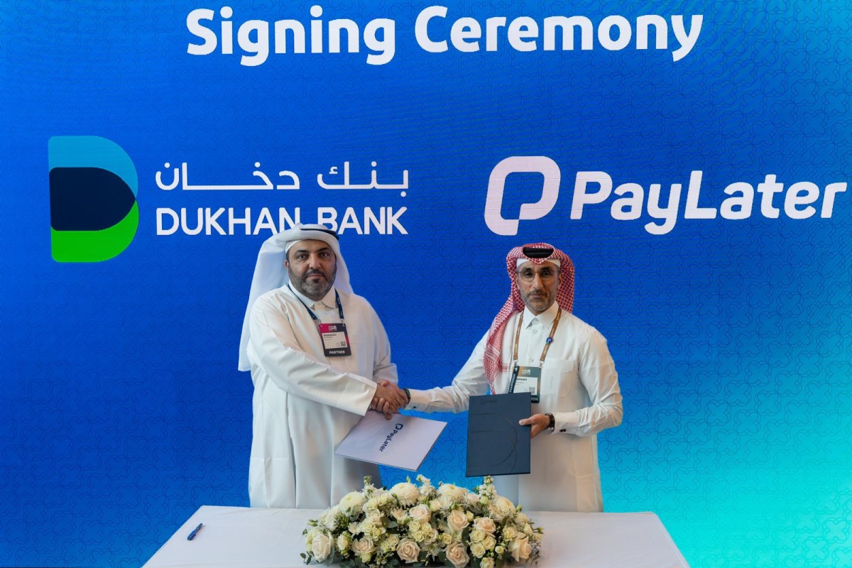 Dukhan Bank and PayLater officials during the signing ceremony.