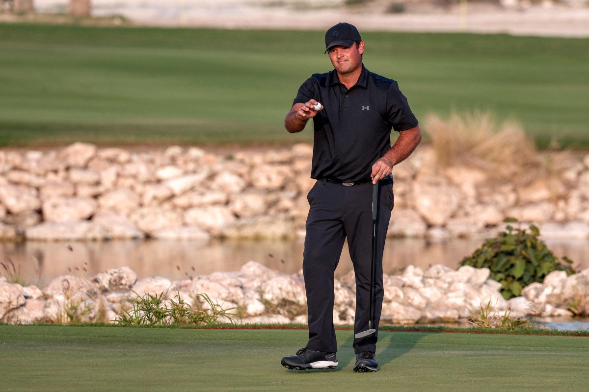 Patrick Reed celebrates after winning the Qatar Masters 2026. (AFP)