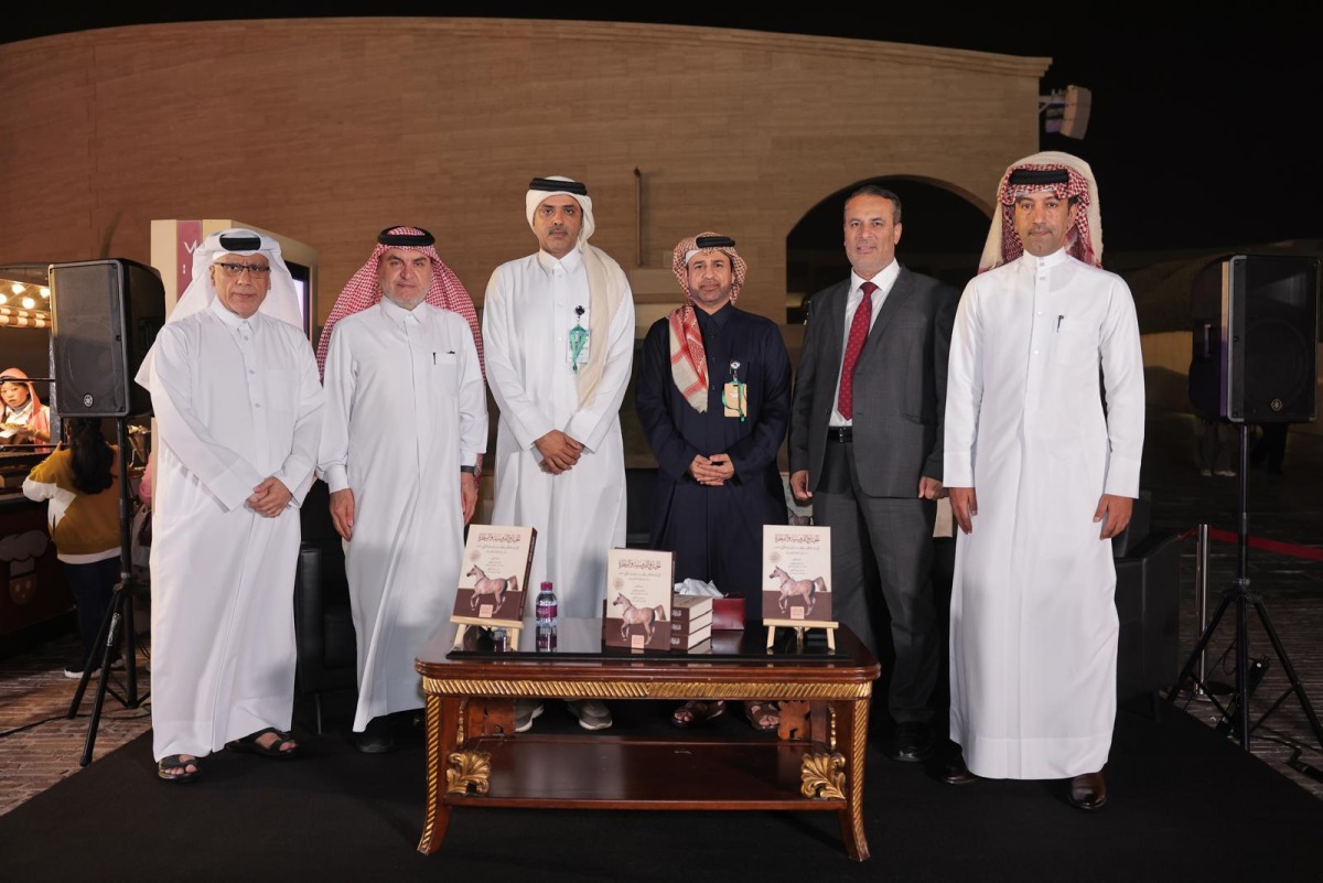Director General of the Katara Cultural Village Foundation Professor Dr. Khalid bin Ibrahim Al-Sulaiti (third right) with others during the launch of the book yesterday.