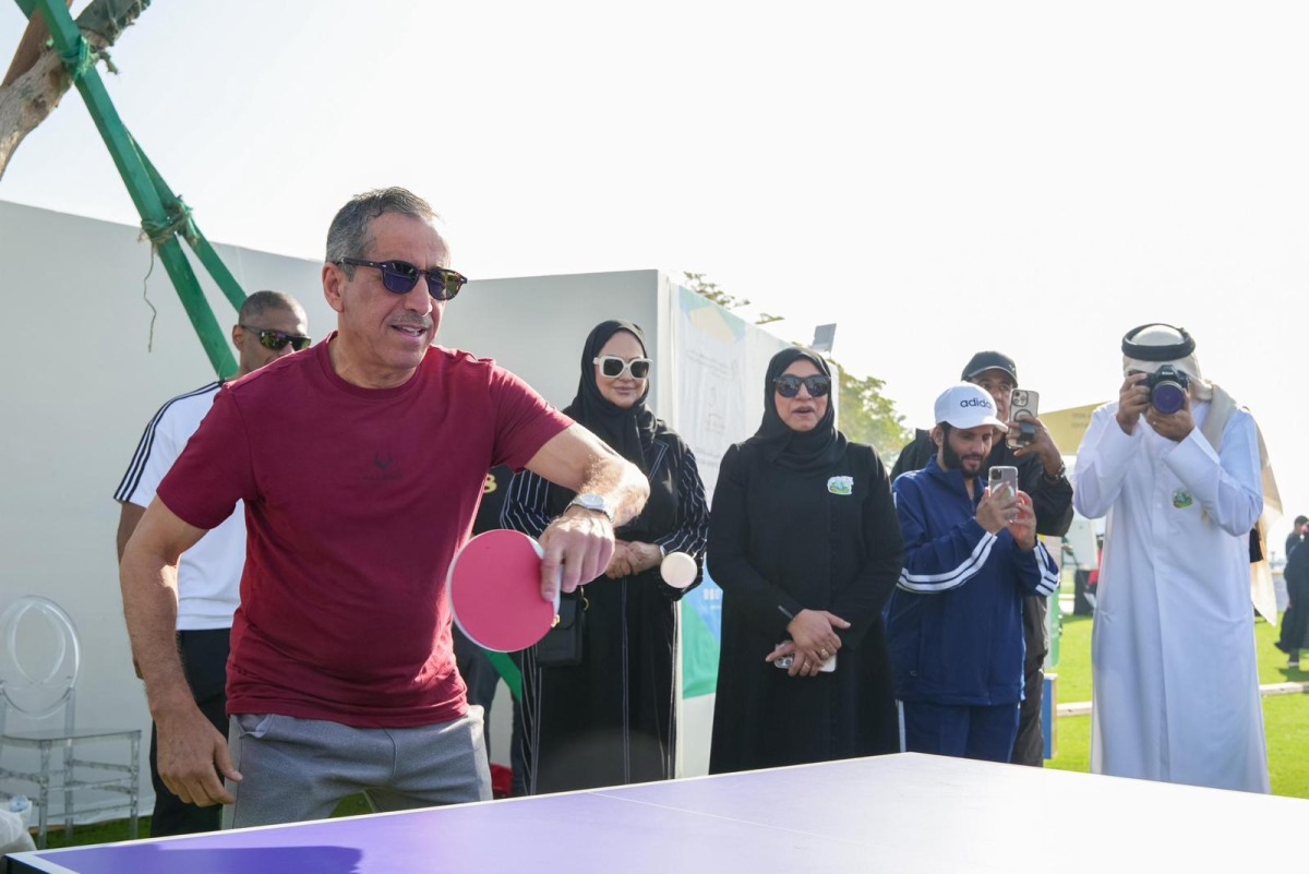 Undersecretary of the Ministry of Education and Higher Education Ibrahim bin Saleh Al Nuaimi participating in a game of table tennis at the event. 

