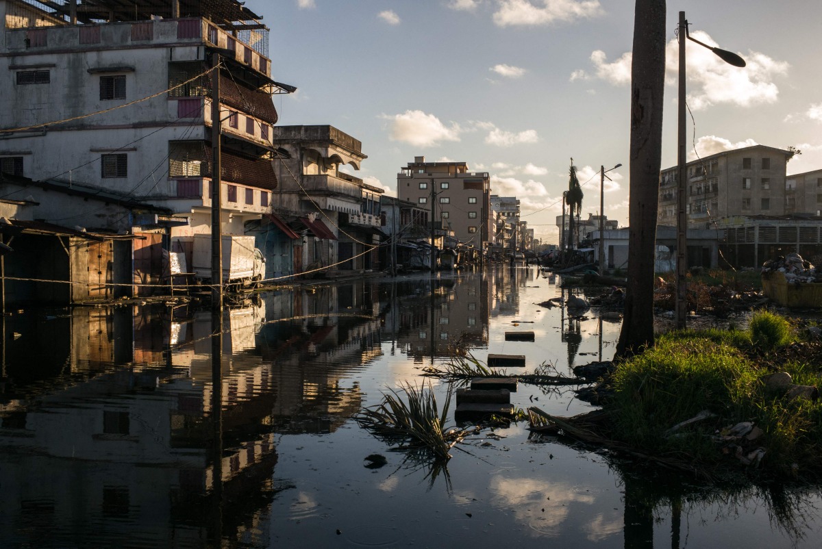 General view of a flooded street in Toamasina on February 15, 2026 after the passage of tropical cyclone Gezani. Photo by RIJASOLO / AFP