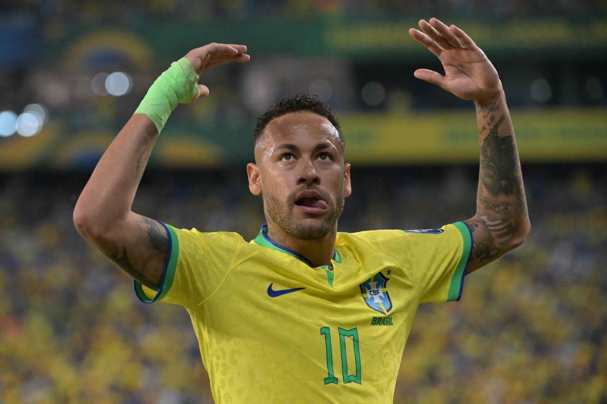 (FILES) Brazil's forward Neymar gestures during the 2026 FIFA World Cup South American qualification football match between Brazil and Venezuela at the Arena Pantanal stadium in Cuiaba, Mato Grosso State, Brazil, on October 12, 2023. (Photo by NELSON ALMEIDA / AFP)
