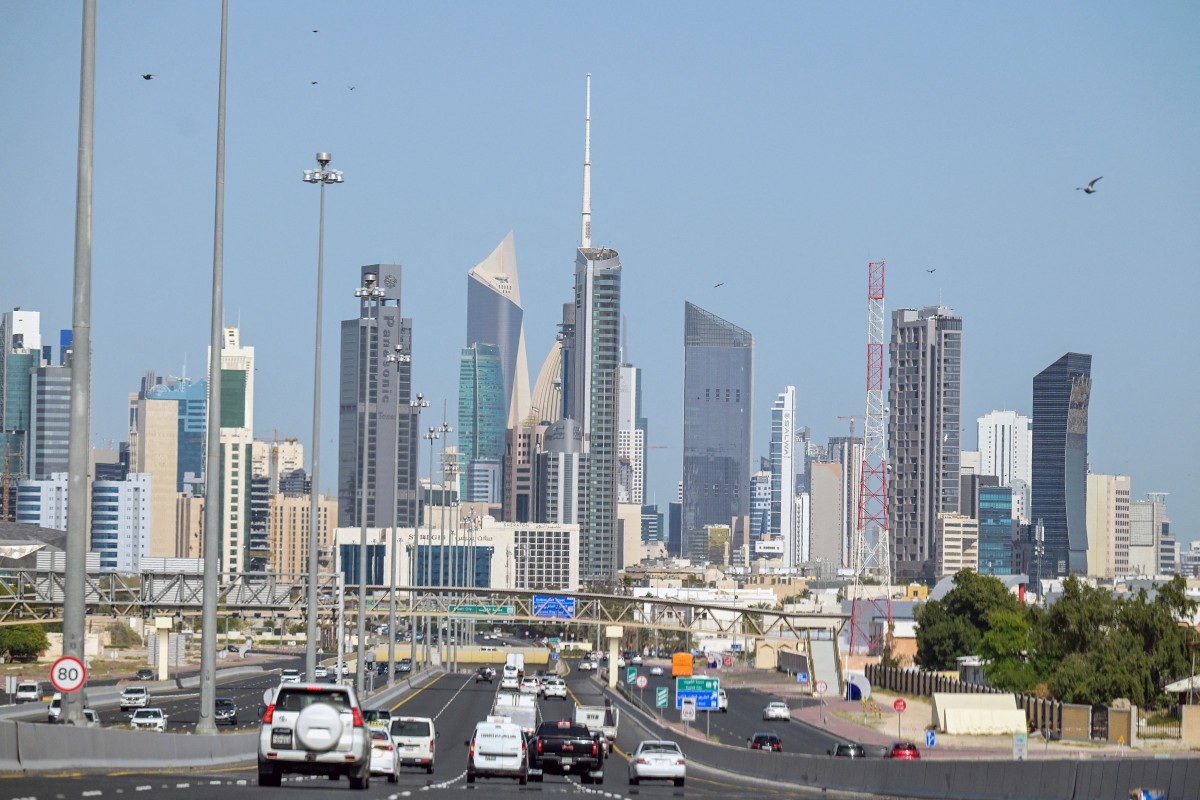 Vehicles drive along the highway leading to and from Kuwait City on March 2, 2026. Photo by Yasser Al-Zayyat / AFP
