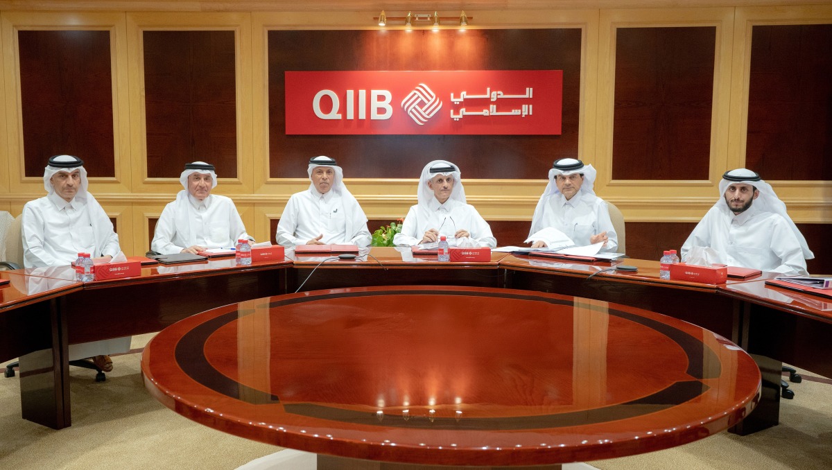 Chairman of the Board of Directors of QIIB Sheikh Dr. Khalid bin Thani bin Abdullah Al-Thani, CEO of QIIB Dr. Abdulbasit Ahmed A Al-Shaibei with other officials during the Ordinary General Assembly meeting.