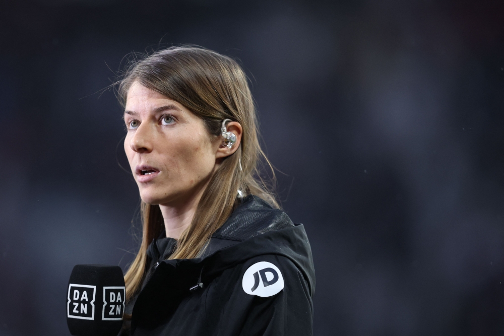 (Files) Union Berlin's German assistant coach Marie-Louise Eta gives an interview in Leipzig, eastern Germany on February 4, 2024. (Photo by Ronny Hartmann / AFP) 