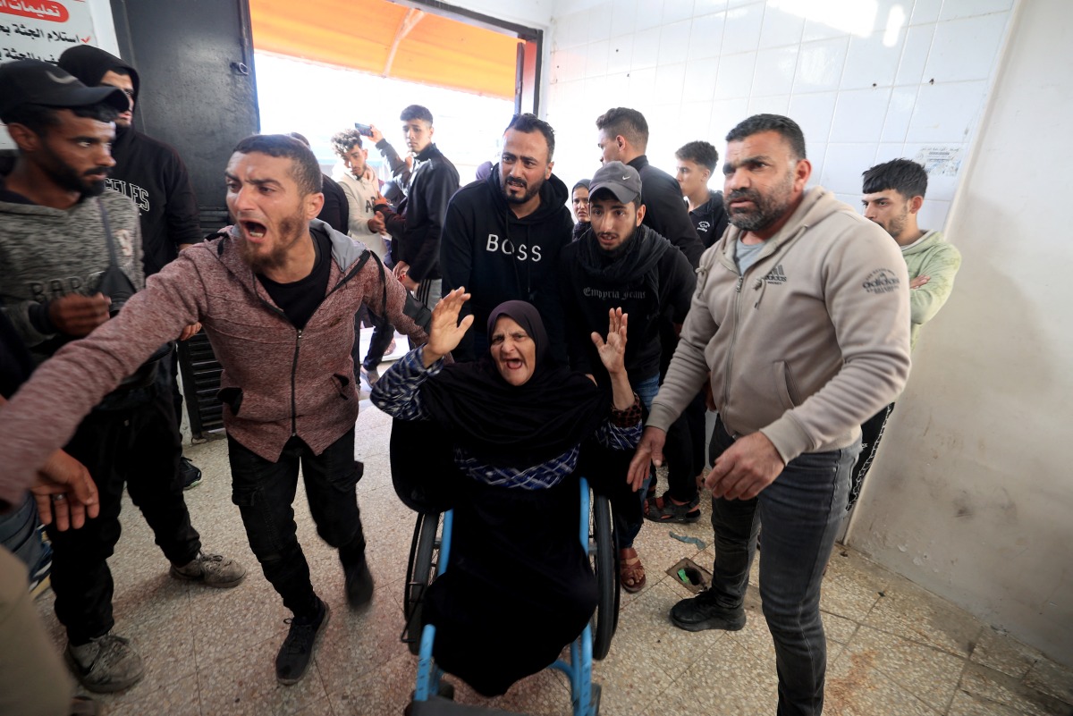 Family members arrive at the Al-Aqsa Martyrs Hospital in Deir al-Balah, where victims have been brought following an Israeli strike on the Al-Maghazi refugee camp in the central Gaza Strip on April 6, 2026. Photo by EYAD BABA / AFP
